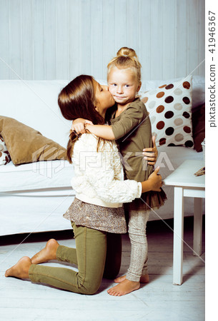 little cute boy and girl hugging playing on white background, ha little cute boy and girl hugging playing on white background, ha 41946367