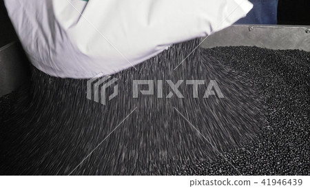 Plastic black gray granulated crumb. Manufacture of plastic water pipes factory. Process of making Plastic black gray granulated crumb. Manufacture of plastic water pipes factory. Process of making 41946439
