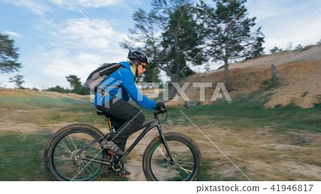 Fat bike also called fatbike or fat-tire bike in summer driving the hills. 41946817