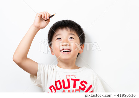 A boy with a pencil A boy with a pencil 41950536
