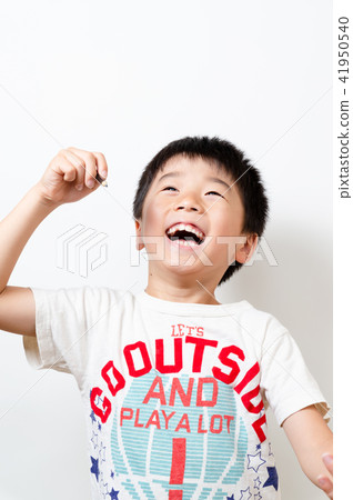 A boy with a pencil A boy with a pencil 41950540