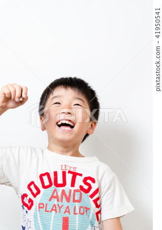 A boy with a pencil A boy with a pencil 41950541
