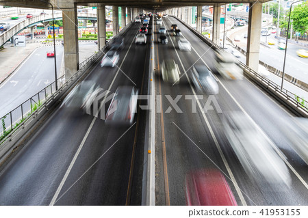 Motion blur of car on the road in the city 41953155
