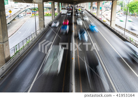 Motion blur of car on the road in the city 41953164