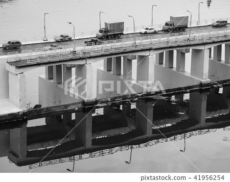 Toy model figure cars on bridge across river scene 41956254
