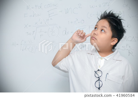 Scientist boy thinking on white background 41960584