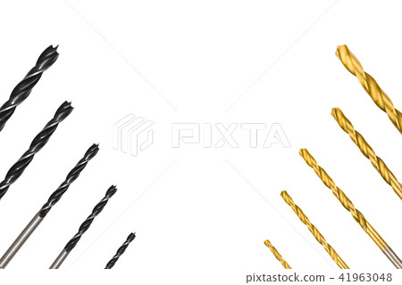 Black and yellow metal drill bits isolated. 41963048