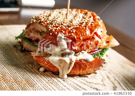Fast food burger bitten off 41963330