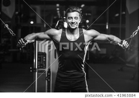 Handsome model young man workout in gym 41963884