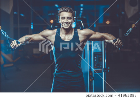 Handsome model young man workout in gym Handsome model young man workout in gym 41963885