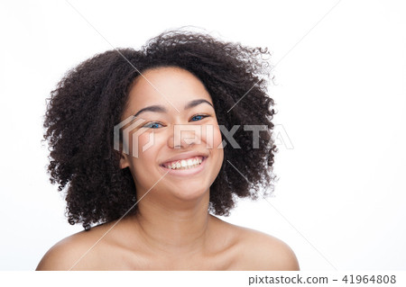 Portrait of a smiling young beautiful african teenage, Isolated on white background Portrait of a smiling young beautiful african teenage, Isolated on white background 41964808