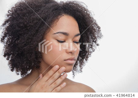 Portrait of a young beautiful african teenage, Isolated on white background Portrait of a young beautiful african teenage, Isolated on white background 41964814