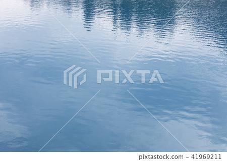 Water in the pond to reflect the sky Water in the pond to reflect the sky 41969211