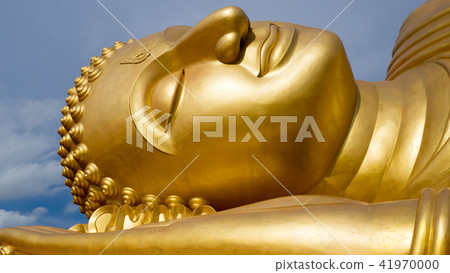 Reclining Golden Buddha face at wat Lampho 41970000