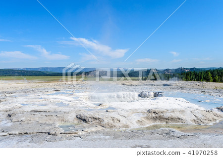 Smoking Geyser in Yellowstone Smoking Geyser in Yellowstone 41970258