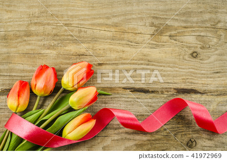 Empty wooden background with colorful flowers 41972969