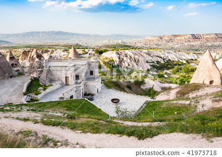 modern and ancient rock-cut houses in Uchisar modern and ancient rock-cut houses in Uchisar 41973718