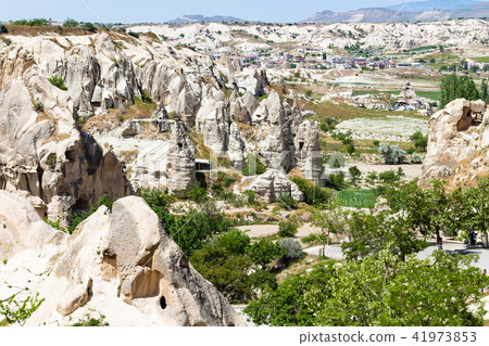 view of valley and Goreme town in Cappadocia view of valley and Goreme town in Cappadocia 41973853