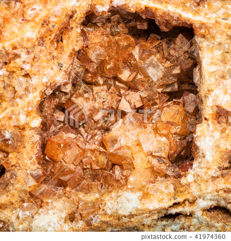 Wulfenite crystals in geode close up 41974360