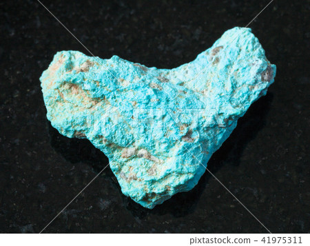 raw Turquoise gemstone on black raw Turquoise gemstone on black 41975311