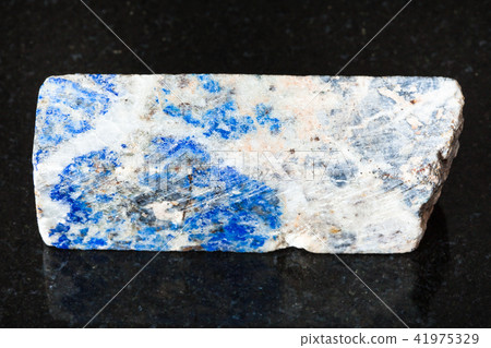 rod from Lazurite stone on black 41975329