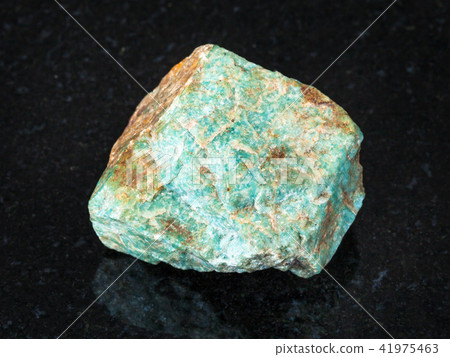 raw Amazonite stone on black raw Amazonite stone on black 41975463