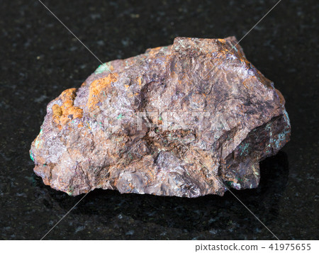 Cuprite and Malachite in Limonite rock on dark 41975655