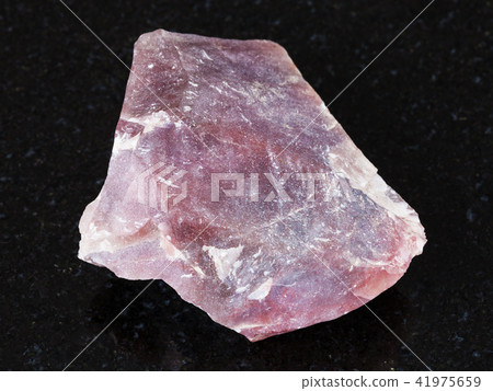 rough pink Flint stone (Chalcedony) on black rough pink Flint stone (Chalcedony) on black 41975659