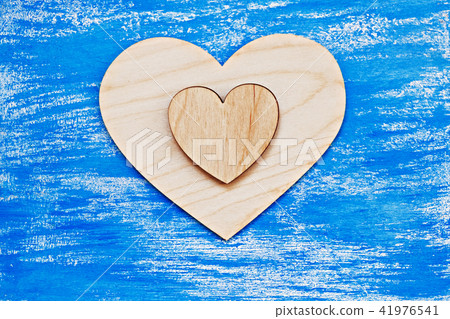 two wooden hearts on rustic background 41976541