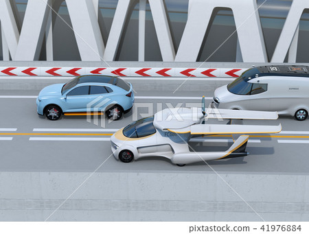 Concept image of a flying car running alongside a car on a highway Concept image of a flying car running alongside a car on a highway 41976884