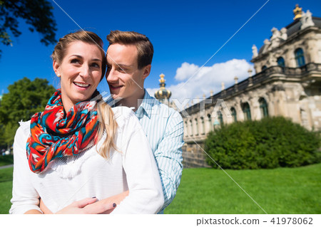 Couple in Dresden at Zwinger with coffee 41978062