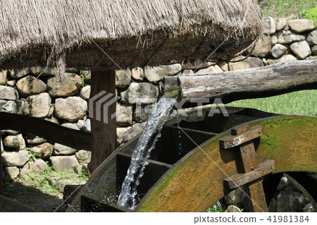 Water mill and cool falling water Water mill and cool falling water 41981384