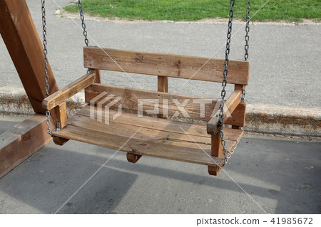 Swing made of wooden planks Swing made of wooden planks 41985672