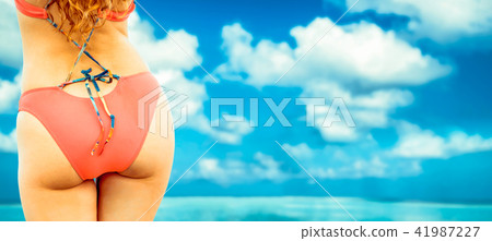 Happy young woman at beach in summer vacation. 41987227