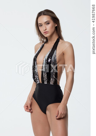 Hot woman in beachwear looking at camera 41987668