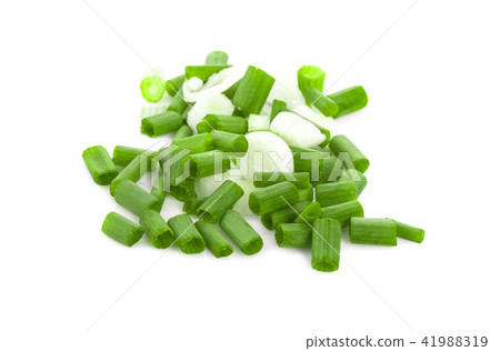 chopped green onions on white 41988319