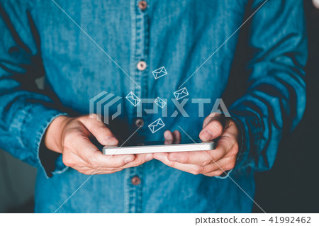 Businessman using mobile online icon social  41992462