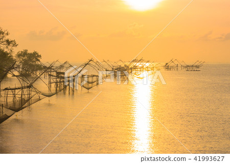 sunshine at  fishing trap at Pak Pra in Talay Noi 41993627