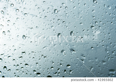 Textured background of window panes with a cloudy background. Natural pattern from a drop of rain on Textured background of window panes with a cloudy background. Natural pattern from a drop of rain on 41993802