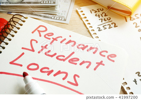 Refinance Student Loans form on a desk. Refinance Student Loans form on a desk. 41997200