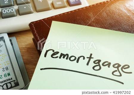 Remortgage concept. Memo stick and money. 41997202