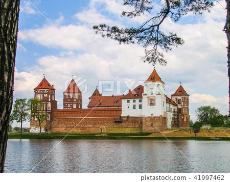 Mir, Belarus. Castle Complex Mir On Sunny Day with blue sky Background. Old medieval Towers and 41997462