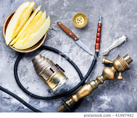 oriental shisha with melon oriental shisha with melon 41997482