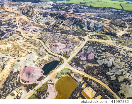 The colourful remains of the former copper mine Parys Mountain near Amlwch on the Isle of Anglesey The colourful remains of the former copper mine Parys Mountain near Amlwch on the Isle of Anglesey 41997883