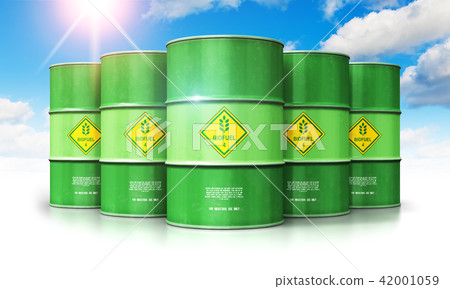 Green biofuel drums against blue sky with clouds 42001059