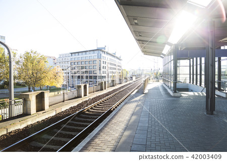 beautiful empty train station in sun light beautiful empty train station in sun light 42003409