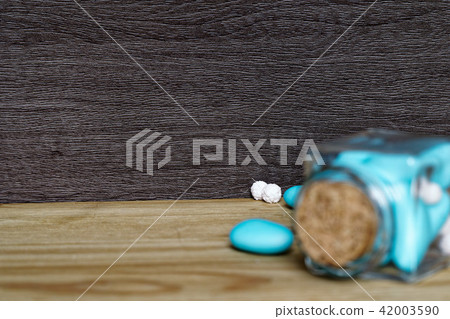 Decorative jar with bow and blue stones Decorative jar with bow and blue stones 42003590