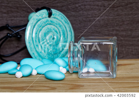 Decorative jar with bow and blue stones Decorative jar with bow and blue stones 42003592