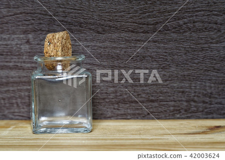 Jar with cork on wooden table, Jar with cork on wooden table, 42003624