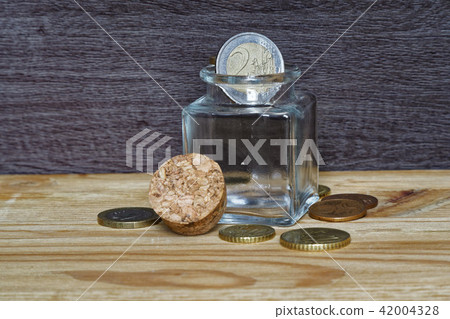 Idea in business casual stacking money as concept Idea in business casual stacking money as concept 42004328